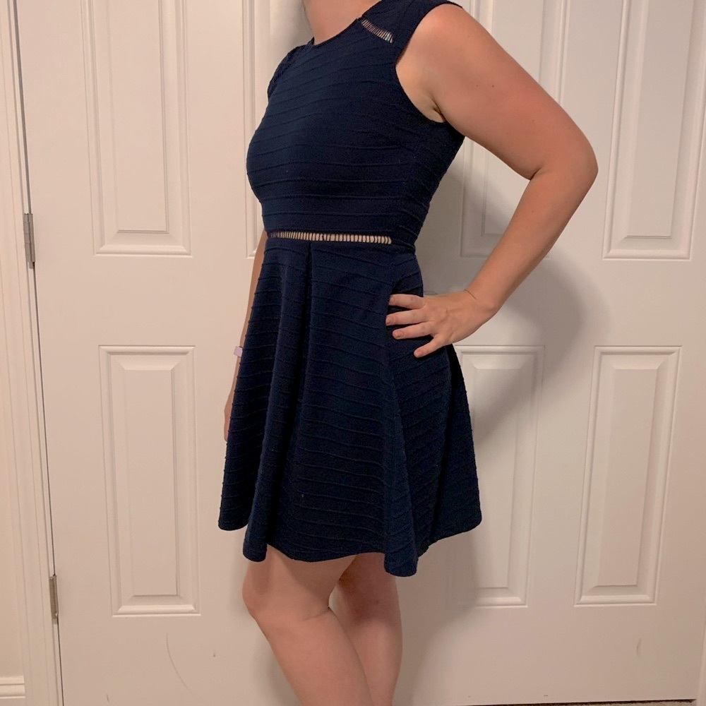 Francesca’s Collections Miami Navy blue dress with midriff and shoulder cutouts